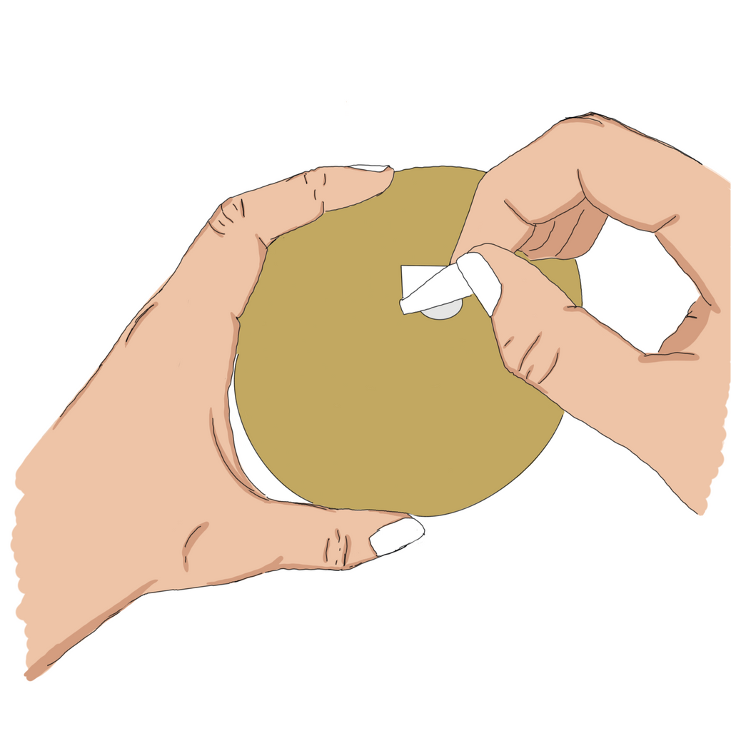 attaching smaller balloons to balloon arch with glue dots